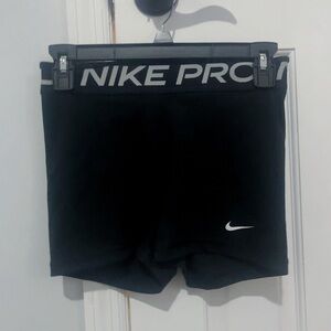 nike pros in black size small